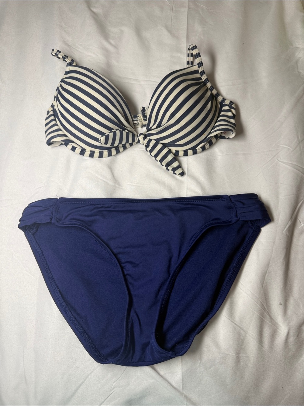 White and navy blue striped top bikini with navy blue bottoms